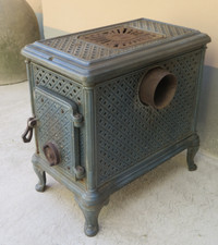 STUFA ANTICA IN GHISA SMALTATA